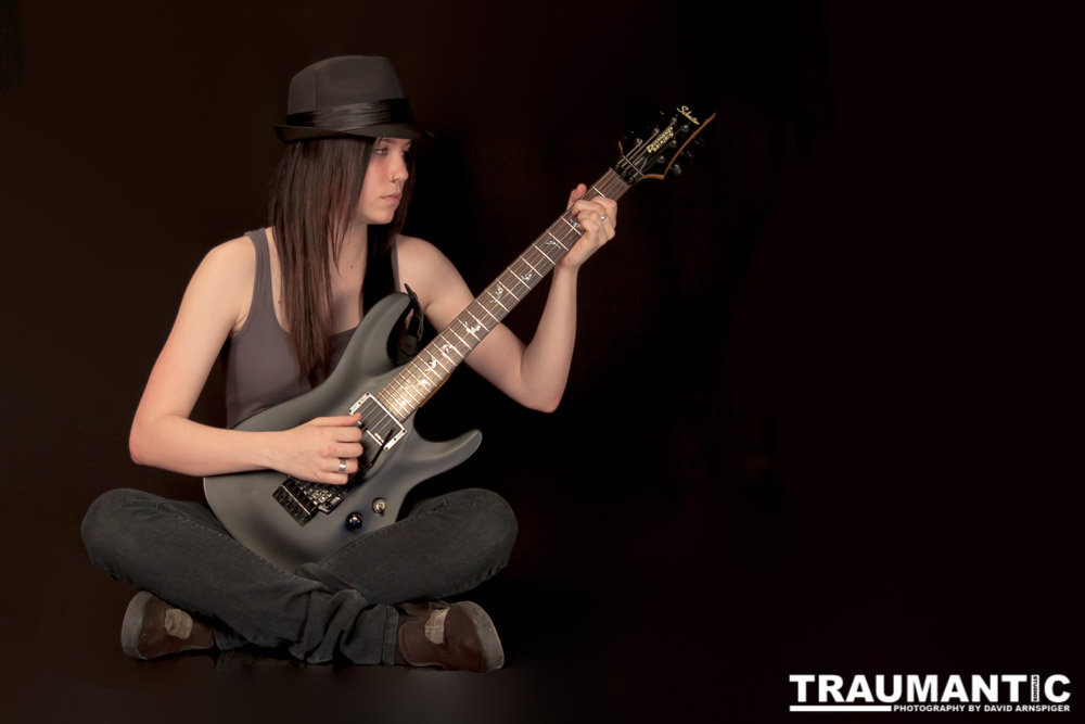 I saw an amazing picture on a web site of this female guitarist.  She was beautiful.  After a bit of searching, I was able to contact her and we did this shoot together.